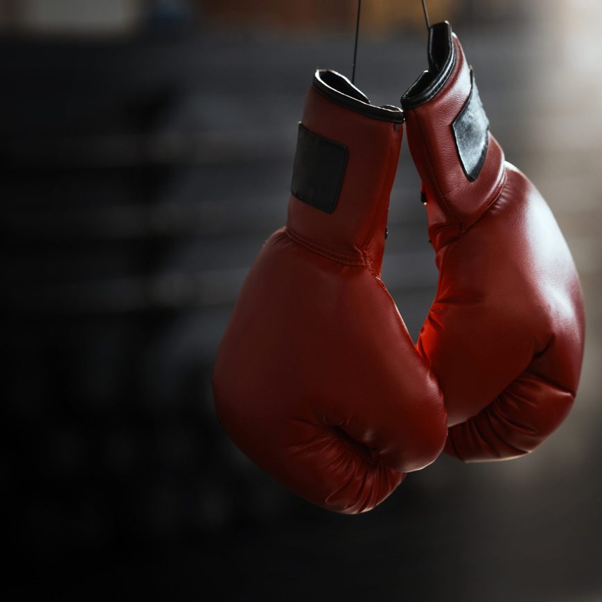 Empty, gym and boxing gloves for fitness, sports and training, wellness and healthy lifestyle. Protective, glove and fighting sport equipment at a health center for workout, endurance and challenge.